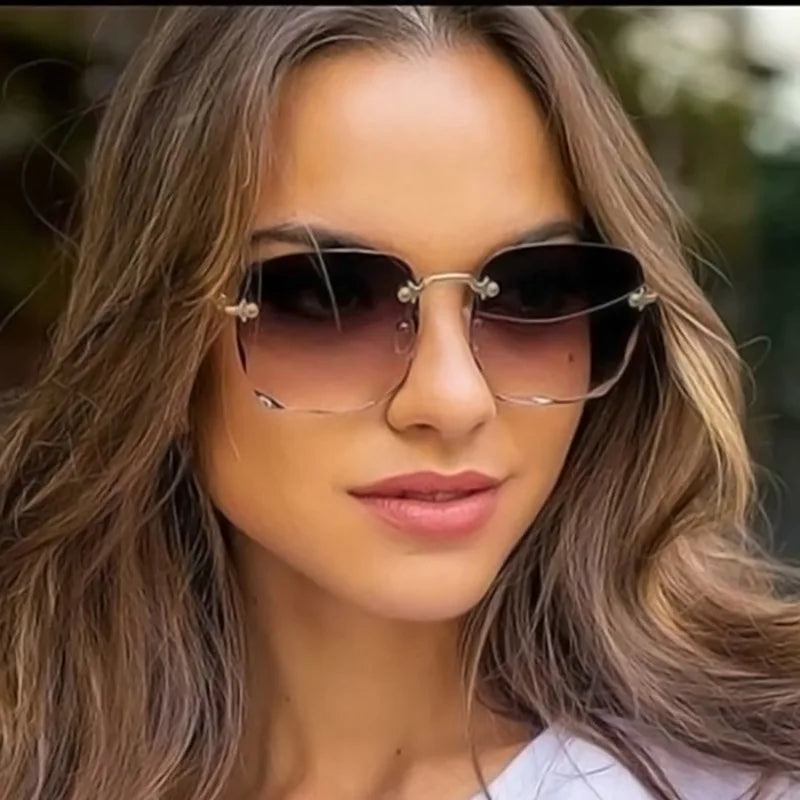 Stijlvolle 2023 Vierkante Rimless Zonnebril voor Vrouwen – Luxe Designer Rode Zonnebril voor Zomer Mode, UV400 Bescherming voor Mannen en Vrouwen!