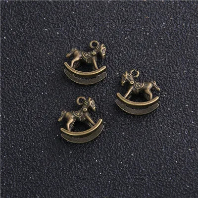 14pcs Antique Bronze Rocking Horse Charms Mini Metal Toy Pendants for Jewelry Making