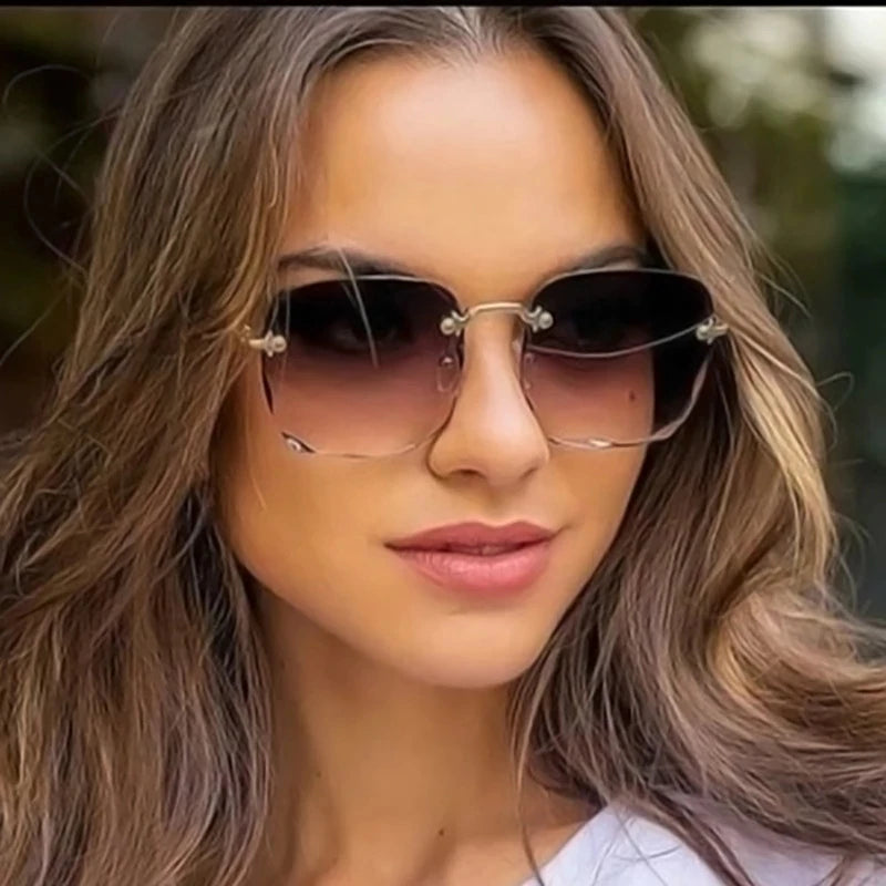 Stijlvolle 2023 Vierkante Rimless Zonnebril voor Vrouwen – Luxe Designer Rode Zonnebril voor Zomer Mode, UV400 Bescherming voor Mannen en Vrouwen!