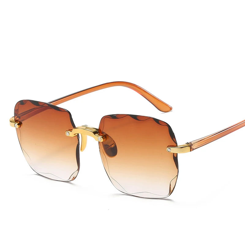 Stijlvolle 2023 Vierkante Rimless Zonnebril voor Vrouwen – Luxe Designer Rode Zonnebril voor Zomer Mode, UV400 Bescherming voor Mannen en Vrouwen!