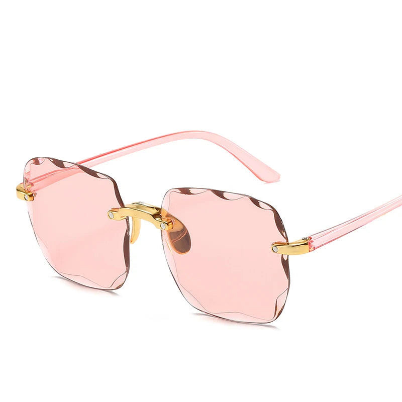 Stijlvolle 2023 Vierkante Rimless Zonnebril voor Vrouwen – Luxe Designer Rode Zonnebril voor Zomer Mode, UV400 Bescherming voor Mannen en Vrouwen!