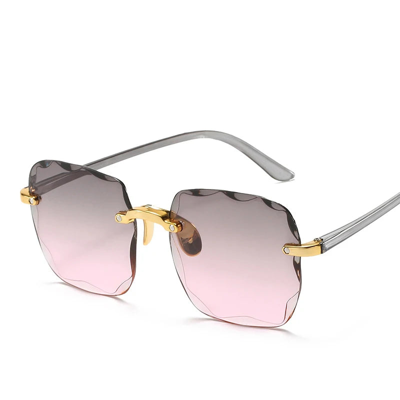 Stijlvolle 2023 Vierkante Rimless Zonnebril voor Vrouwen – Luxe Designer Rode Zonnebril voor Zomer Mode, UV400 Bescherming voor Mannen en Vrouwen!