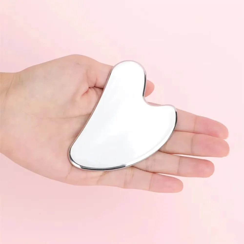 Verhoog je huidverzorgingsroutine met onze hartvormige roestvrijstalen Gua Sha-schaaf – Perfect voor gezichts-massages en lichaamsontspanning!
