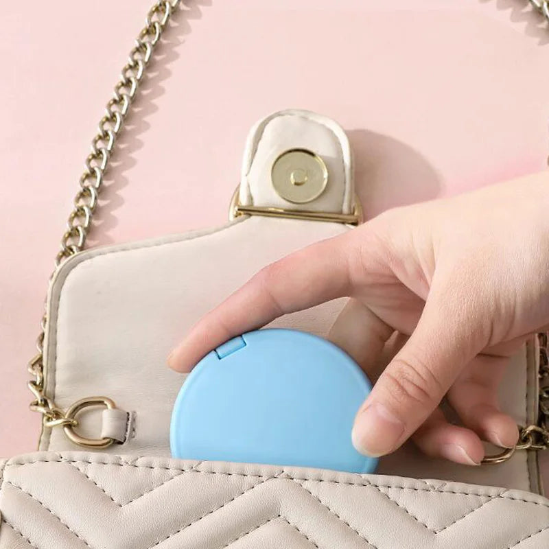 Compact Dubbelzijdige Handheld Make-up Spiegel - Vouwbare Ronde Reisessentieel voor Schoonheids- en Cosmetische Bijwerkingen