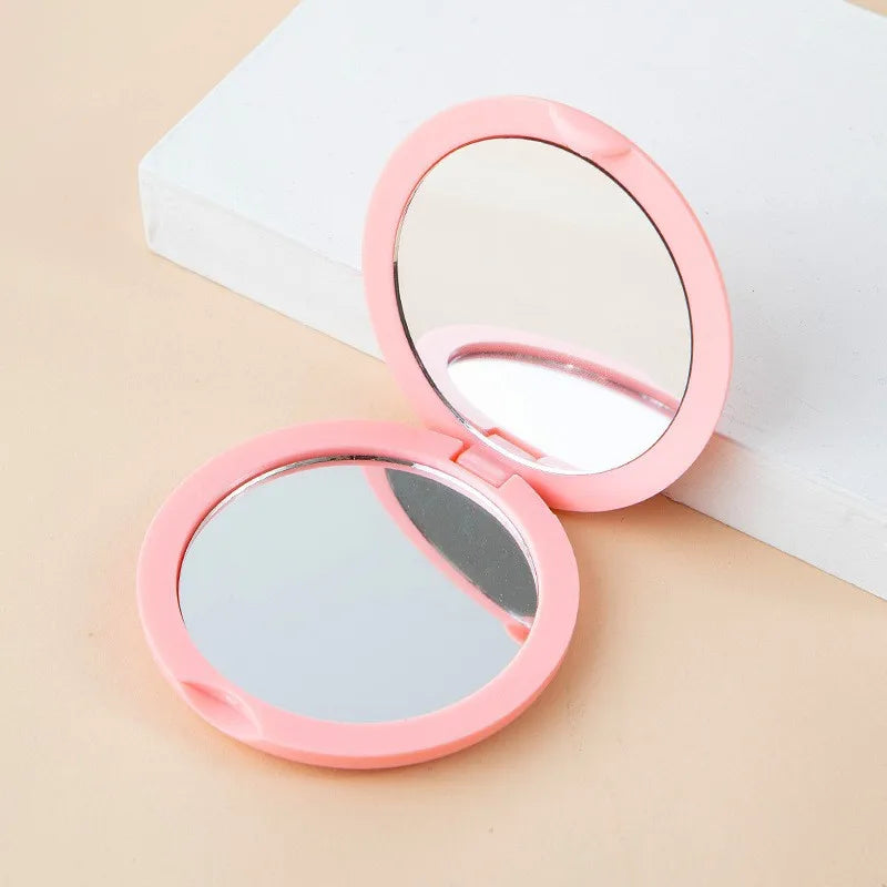 Compact Dubbelzijdige Handheld Make-up Spiegel - Vouwbare Ronde Reisessentieel voor Schoonheids- en Cosmetische Bijwerkingen