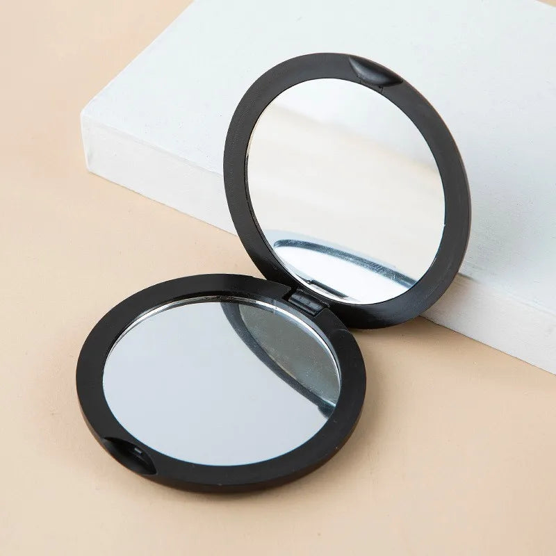 Compact Dubbelzijdige Handheld Make-up Spiegel - Vouwbare Ronde Reisessentieel voor Schoonheids- en Cosmetische Bijwerkingen