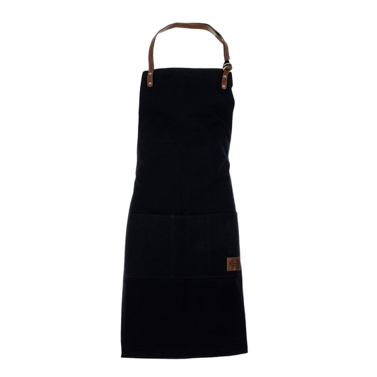 K0015AB | Work Apron in Canvas/Genuine Full Grain Leather, flywheel. Color Black/Dark Brown. Antique Nickel Accessories. Dimensions: 70 x 90 x 0.5 cm. Packaging: Polybag-0