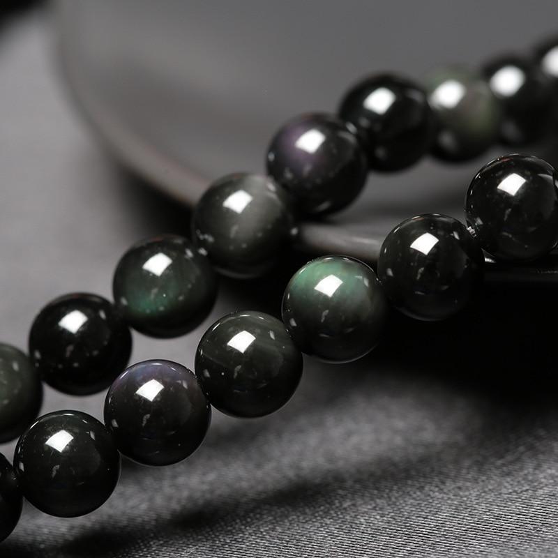 Elegante Obsidiaan Armband met Stralende Blauwe Tijgeroog