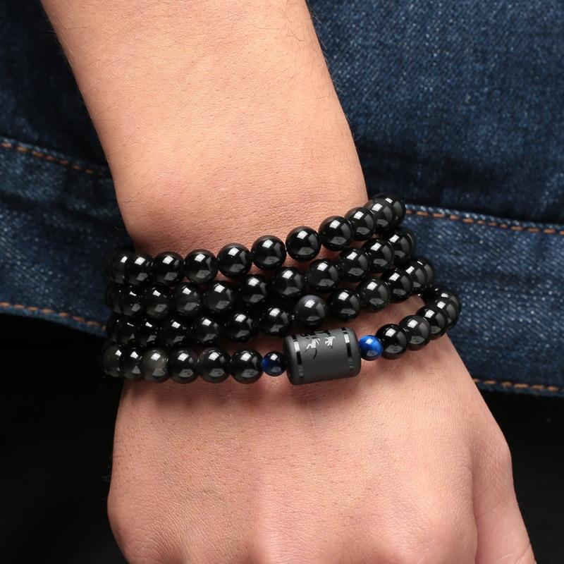 Elegante Obsidiaan Armband met Stralende Blauwe Tijgeroog