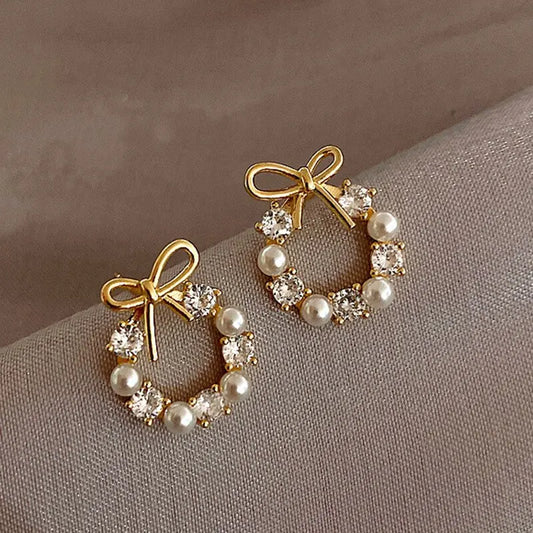Chic Minimalistische Ronde Strik Knoop Oorbellen met Rhinestone en Imitatieparel voor Vrouwen - Perfecte Modeaccessoires voor Feesten en Bruiloften