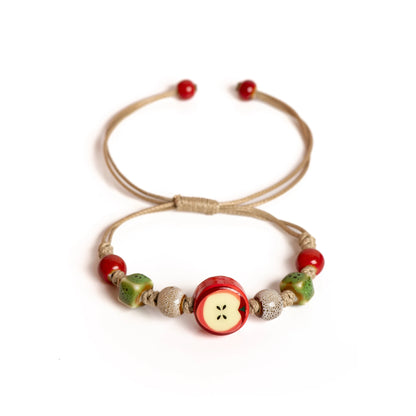 Charmante Ambachtelijke Appel Keramische Armband met Verstelbaar Geweven Koord - Schattige Cartoon Sieraad Perfect voor Cadeaus