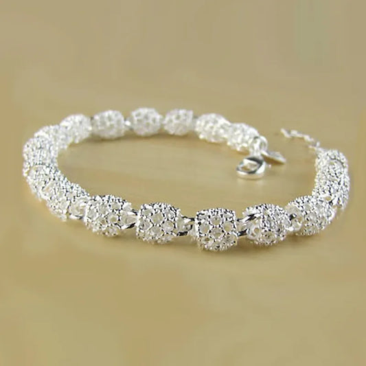 Elegante 925 Zilveren Bloem Kralen Bedelarmband voor Vrouwen - Verstelbaar Holle Balontwerp Perfect voor Huwelijken en Bijzondere Gelegenheden