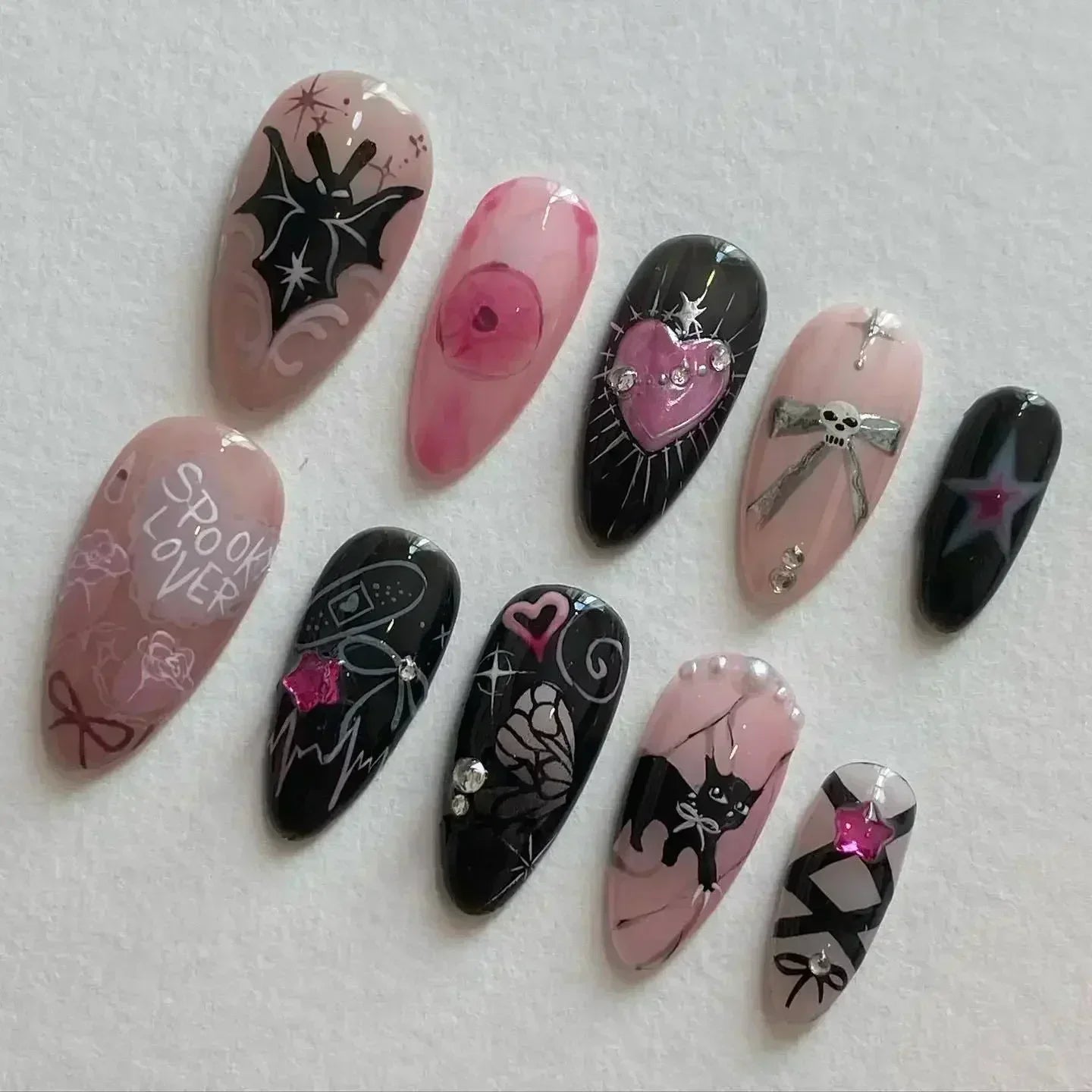 24-delige afneembare Franse nepvalse nagels set met bloem, amandelvorm, sterren en glitters ontwerp - Perfect voor DIY manicure liefhebbers!