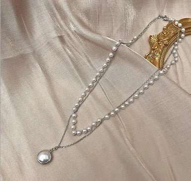 Elegante Dubbel Laags Parels Choker Ketting met Hart Bedel - Perfect Sieraden Geschenk voor Vrouwen
