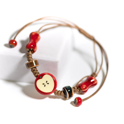 Charmante Ambachtelijke Appel Keramische Armband met Verstelbaar Geweven Koord - Schattige Cartoon Sieraad Perfect voor Cadeaus