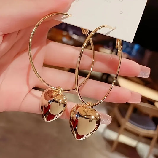 Chique Hartvormige Holle Hoop Oorbellen - Elegante Legerings Sieraden voor Vrouwen - Perfect voor Date Nights en Weekendjes Weg