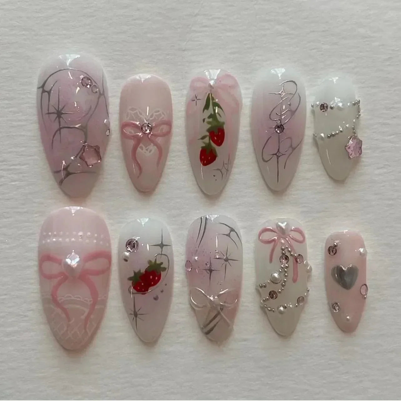 24-delige afneembare Franse nepvalse nagels set met bloem, amandelvorm, sterren en glitters ontwerp - Perfect voor DIY manicure liefhebbers!