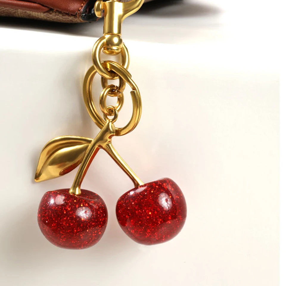 ZAKOL Stijlvolle Rode Kers Sleutelhanger - Vrolijke Zomerfruit Hanger Sleutelhanger voor Mannen en Vrouwen - Perfecte Sieraden Tasaccessoire Cadeau