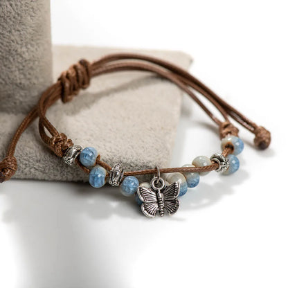 Exquise Handgemaakte Vlinder Keramiek Gebroken IJs Vintage Verstelbare Armband - Bohemian Chic Sieraden op Elastic Band, een Uniek Cadeau Idee! H920