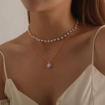 Elegante Dubbel Laags Parels Choker Ketting met Hart Bedel - Perfect Sieraden Geschenk voor Vrouwen