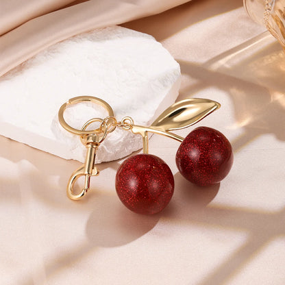 ZAKOL Stijlvolle Rode Kers Sleutelhanger - Vrolijke Zomerfruit Hanger Sleutelhanger voor Mannen en Vrouwen - Perfecte Sieraden Tasaccessoire Cadeau